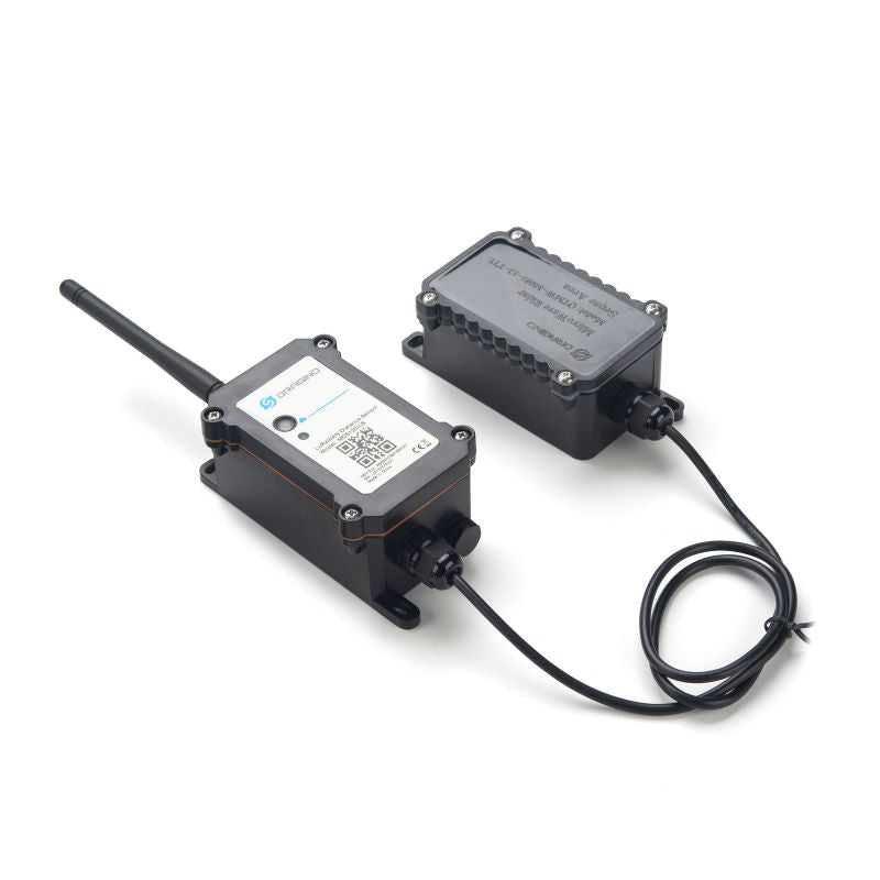 The Dragino MDS120-LB-EU868 Microwave Radar Distance Sensor is a black electronic device with LoRaWAN capability, featuring connected sensors and an antenna for distance or object proximity detection.
