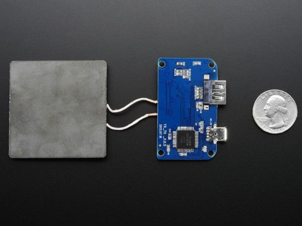 adafruit-universal-qi-wireless-charging-transmitter-02_600x600.jpg